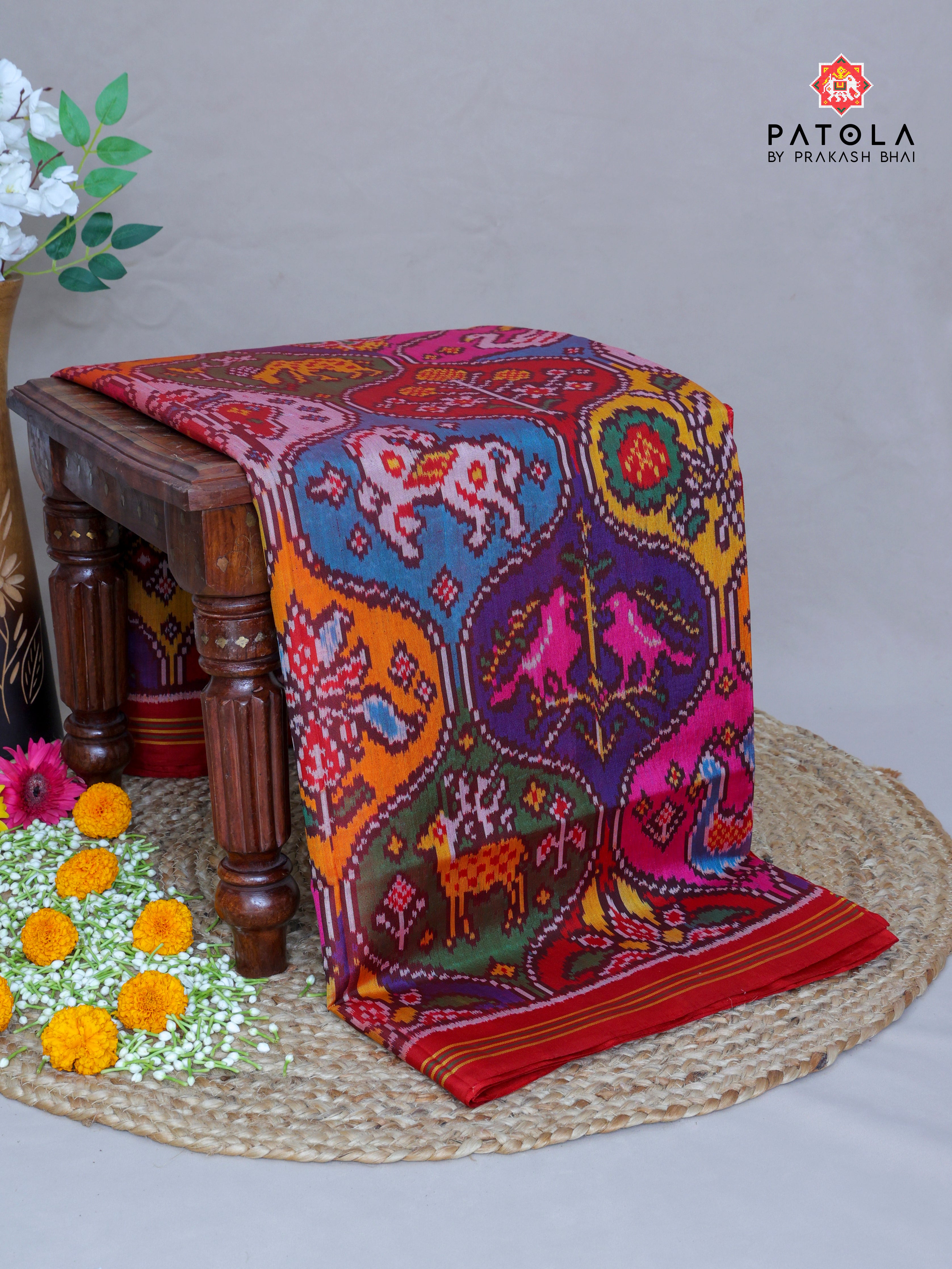 Masterpiece Multicolor Motifs Designer Semi Double Ikat Patola Saree